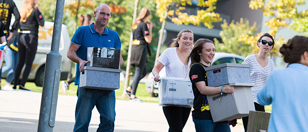 People carrying boxes